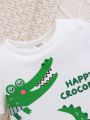 SHEIN Baby Boys' Cartoon Crocodile Pattern Round Neck Short Sleeve Top And Casual Shorts Set