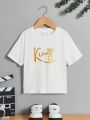 SHEIN Kids EVRYDAY Young Boy Casual & Comfortable Crown & Letter Printed Short Sleeve T-Shirt