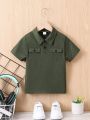 SHEIN Kids EVRYDAY Toddler Boys' Short Sleeve Solid Color Dual Pocket Polo Shirt For Summer
