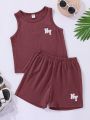SHEIN Kids EVRYDAY Young Boy Casual And Comfortable Letter Printed Vest And Shorts Set