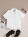 SHEIN Kids EVRYDAY Boys' Slim Fit Casual Peter Pan Collar Solid Color Shirt