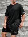 SHEIN Extended Sizes Men Plus Letter Patched Tee & Shorts