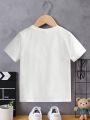 SHEIN Young Boys' Casual Cartoon Slogan Printed Short Sleeve Round Neck T-Shirt, Suitable For Summer