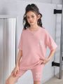 SHEIN Kids Cooltwn Tween Girls' Loose Knit Short Sleeve T-Shirt With Slogan Print + Slim Fit Shorts Sports Set