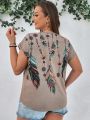 SHEIN LUNE Feather Print Round Neck T-Shirt Plus Size