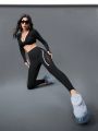 Sports Leggings With Reflective Stripe And Mesh Splicing Design