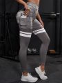 Yoga Trendy Striped & Camo Print Sports Leggings With Phone Pocket