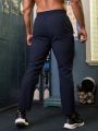 Running Men'S Side Stripe Activewear Sweatpants With Letter Printed Zipper Pockets