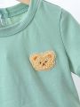 SHEIN Kids EVRYDAY Toddler Boys' Solid Color Shorts Set With Bear Patch Embellished Top