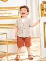 SHEIN Kids Nujoom Young Boy's Cute Turn Down Collar Short Sleeve Shirt And Shorts Set