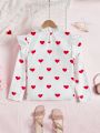 SHEIN Kids EVRYDAY Girls' Love Heart Printed Stand Collar Shirt With Ruffled Hem