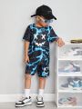 SHEIN Kids Cooltwn Boys' Colorful All-Over Printed Short Sleeve T-Shirt And Shorts Set