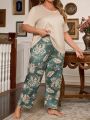 Plus Size Comfortable Solid Color Short Sleeve Top And All-Over Print Pants Pajama Set