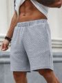 Manfinity Homme Men's Solid Color Elastic Waistband Shorts With Diagonal Pockets
