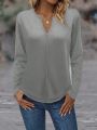 Women's Long Sleeve Top With Notched V-Neckline