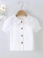 SHEIN Kids FANZEY Little Girls' Casual Irregular Embroidery Doll Collar Bubble Long Sleeve Solid Color Shirt For Summer
