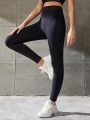 Teenage Girls' Sports Fitness Black Leggings With Peach Hip Detail For Outdoor Activities