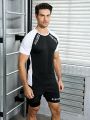 Men's Letter Print Decorated Drop Shoulder Sleeve T-shirt And Shorts Sports Set