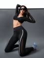 Sports Leggings With Reflective Stripe And Mesh Splicing Design