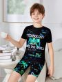 SHEIN Tween Boy Tight-Fitting Casual Round Neck Short Sleeve T-Shirt And Shorts With Glow-In-The-Dark Slogan And Game Console Print, 2pcs Homewear Set