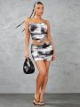 SHEIN BAE Allover Abstract Newspaper Print Fishbone Pleated Strapless Top And Mini Skirt With Pleats