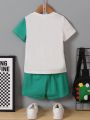 SHEIN Little Boys' Dinosaur Printed Short Sleeve T-shirt And Shorts Set