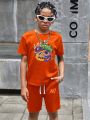 SHEIN Kids Cooltwn Tween Boys' Casual And Comfortable Cartoon Printed T-Shirt And Shorts Sports Set