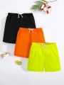 SHEIN Teen Boys' Beach Shorts Basic Design Drawstring Elastic Waistband Woven Shorts, Pack Of 3(One Piece In Each Of Three Colors)