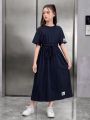 SHEIN Kids Nujoom Big Girls' Loose Vintage Check Pattern Drawstring Waist Bowknot Decorated Dark Blue Midi Dress