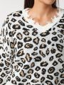 Plus Size Women's Leopard Print Hem Distressed Sweater