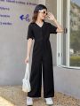 SHEIN Kids EVRYDAY Big Girls' Solid Color Front Button Wide Leg Jumpsuit, Loose Fit And Casual Style
