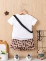 Baby Boy's Solid Color Top And Geometric Printed Shorts Set