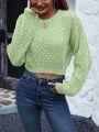 SHEIN Essnce Solid Color Hollow Back Short Sweater
