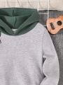 SHEIN Boys' Crocodile Printed Hooded Fleece Sweatshirt