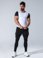 SHEIN Fitness Men's Color Block Short Sleeve T-Shirt And 2-In-1 Leggings Athletic Outfit