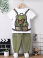 SHEIN Kids QTFun Little Boys' Cartoon Printed Top And Solid Color Pants Two Piece Set