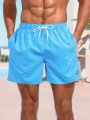 Manfinity Swimmode Men's Solid Color Swim Trunks With Drawstring And Patch