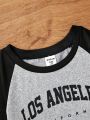 SHEIN Young Girls' Two Tone Letter Print Raglan Short Sleeve T-Shirt