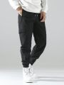 Extended Sizes Men's Solid Color Drawstring Cargo Pants