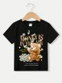 SHEIN Young Boy's Casual Cartoon Printed Short Sleeve Round Neck T-Shirt Suitable For Summer