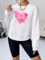SHEIN Essnce Heart & Letter Graphic Sweatshirt