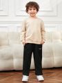 SHEIN Toddler Boys' Casual Comfortable Solid Color Woven Label Knit Straight Leg Pants, Thin