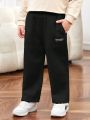 SHEIN Toddler Boys' Casual Comfortable Solid Color Woven Label Knit Straight Leg Pants, Thin