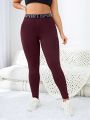 Yoga High Street Plus Size Women'S English Letter Waist Belted Pocketed Leggings For Sports And Street Style