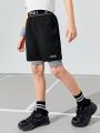 SHEIN Tween Boys' Slim Fit Casual Sport Shorts With Two Tone Design