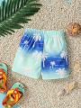 SHEIN Vacation Style Baby Boy's Cute, Casual, Loose Fit, Minimalist Coconut Trees & Ocean Waves Printed Beach Shorts For Summer