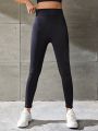 Teenage Girls' Sports Fitness Black Leggings With Peach Hip Detail For Outdoor Activities