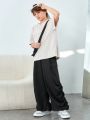 SHEIN Kids EVRYDAY Tween Boy Casual Patch Pocket Loose Trousers