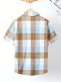 SHEIN Kids Academe Tween Boys' Loose Fit College Style Woven Plaid Short Sleeve Shirt