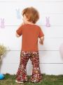 SHEIN Baby Girls' Casual Letter Print Short Sleeve Top And Floral Flared Pants Set